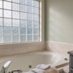 Real Estate - White Ceramic Bathtub Near White Ceramic Bathtub
